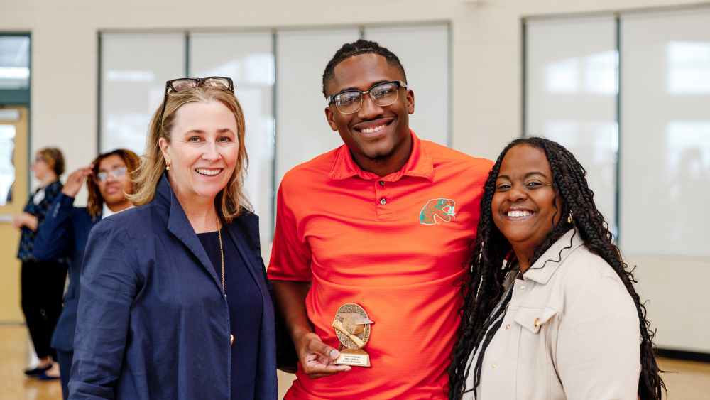 FOSSI graduate, Elijah Hodges (middle), with Eastman representatives, Paula Bucalo (left) and Tanya Foreman (right).