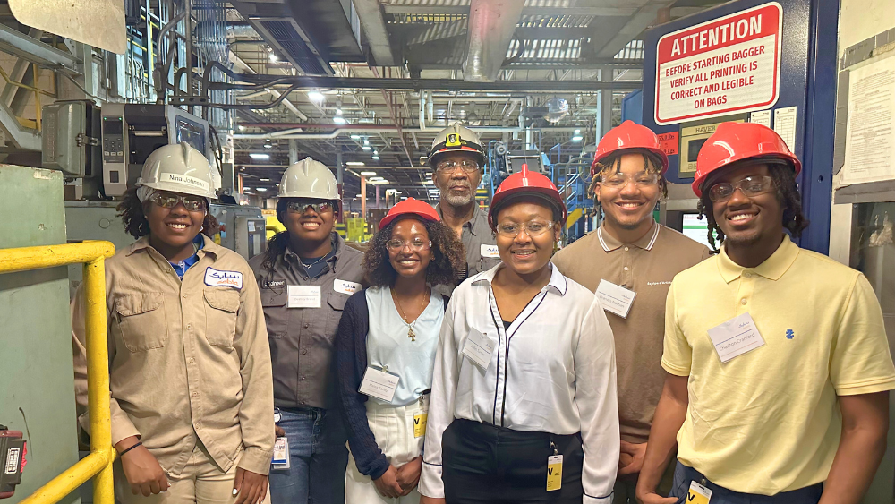 SABIC FOSSI scholars Nina Johnson, computer science major at Alabama State University; Destiny Brand, mechanical engineering major at Alabama A & M University; Melea Earley, environmental science major at Howard University; Jailin Turner, biomedical engineering major at Florida A & M University; Brandis Nathan, chemical engineering major at Prairie View A & M University; Charlton Cranford, computer science major at Prairie View A & M University; with Tray Hill, Color Specialist, BKV Finishing (middle back)